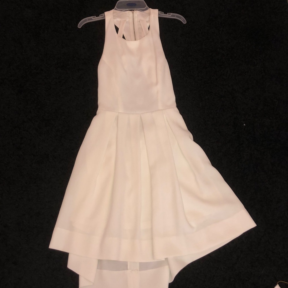 White skater dress with intricate back